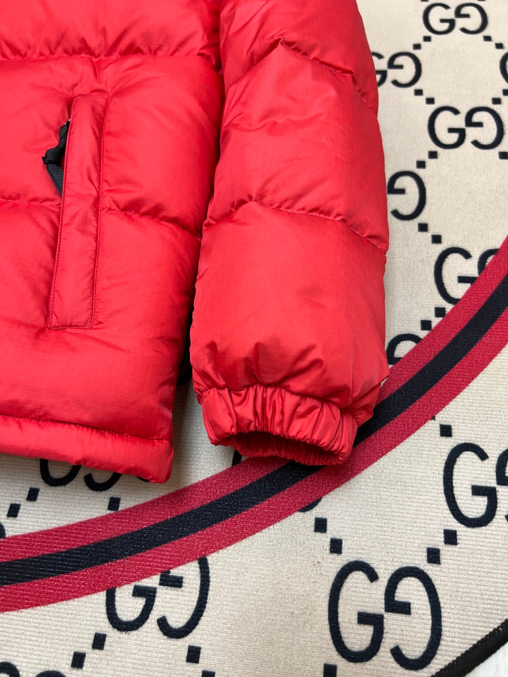 The North Face Quilted Red and Black Stand-Collar Puffer Jacket