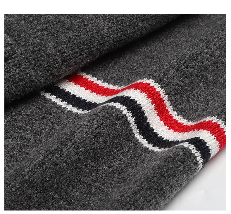Unisex wool coat with webbing sleeves | Thom Browne