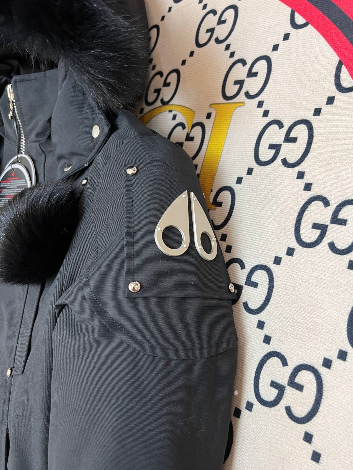 Moose Knuckles Black Cropped Hooded Bomber Jacket with Pom-Poms