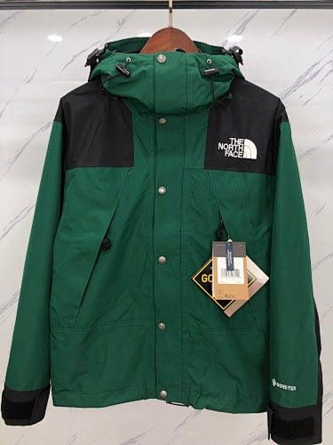 The North Face Forest Green and Black Hooded Jacket