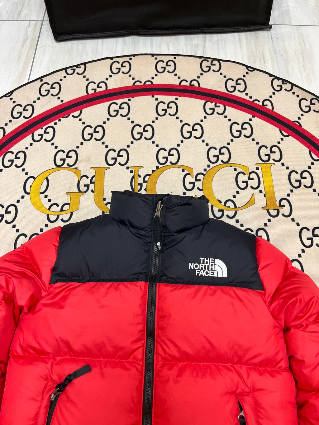 The North Face Quilted Red and Black Stand-Collar Puffer Jacket