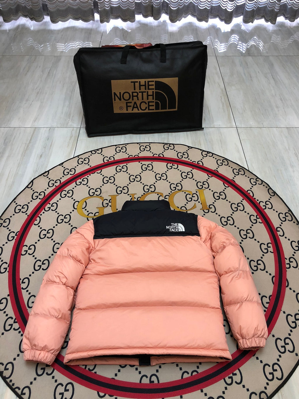 The North Face Quilted Peach Pink and Black Stand-Collar Puffer Jacket