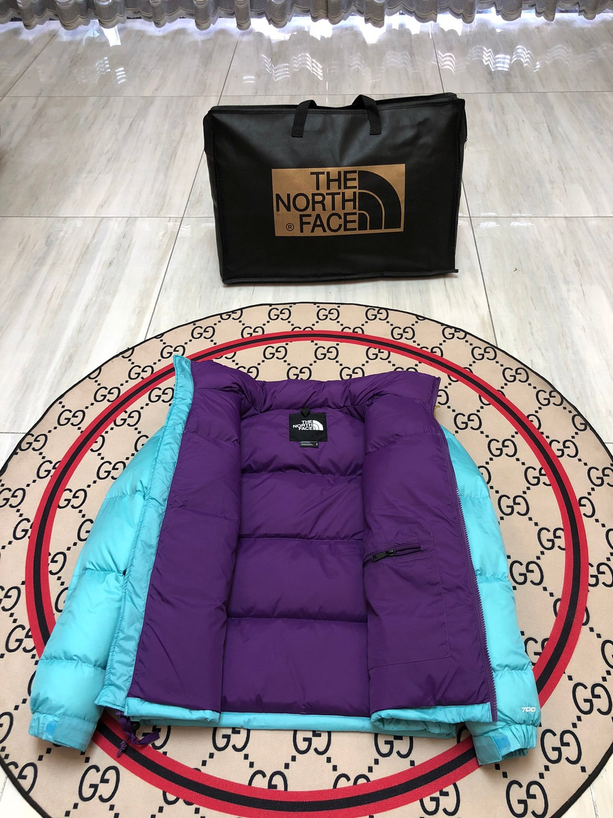 The North Face Quilted Turquoise and Purple Stand-Collar Puffer Jacket