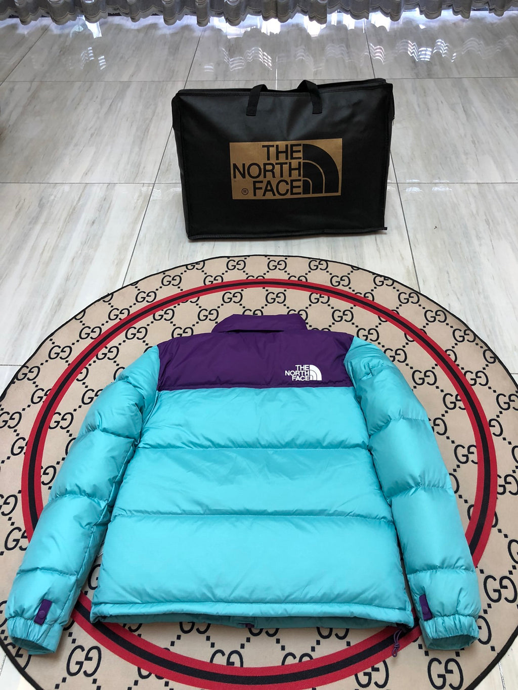 The North Face Quilted Turquoise and Purple Stand-Collar Puffer Jacket