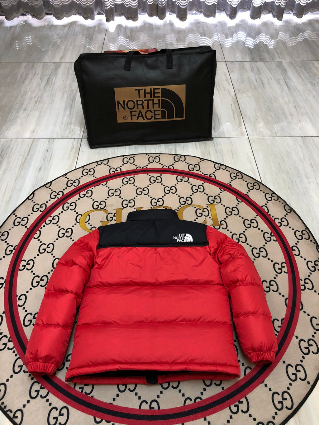 The North Face Quilted Red and Black Stand-Collar Puffer Jacket