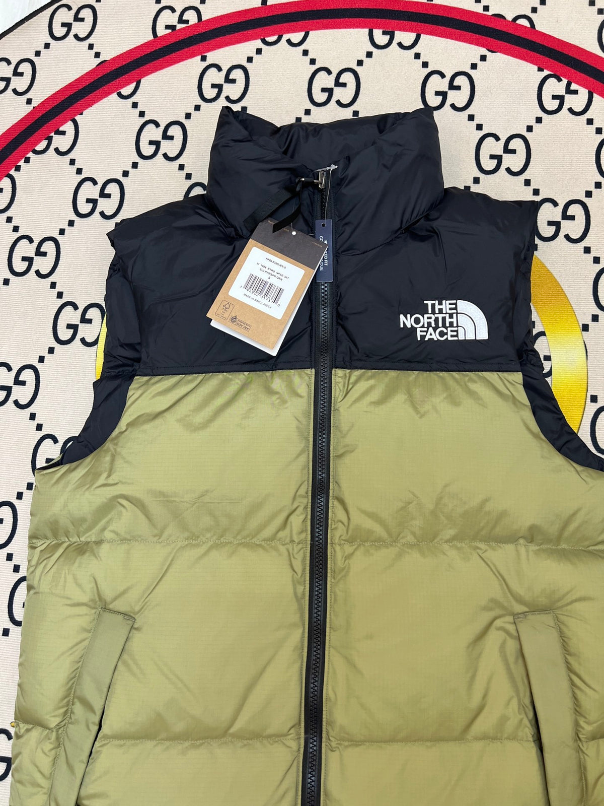The North Face Quilted Olive Green and Black Puffer Vest