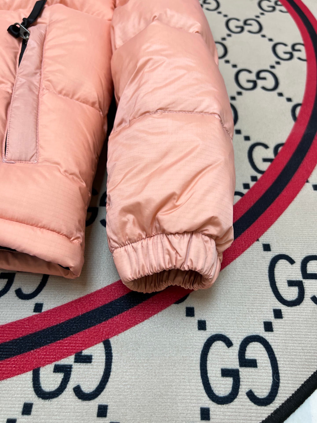 The North Face Quilted Peach Pink and Black Stand-Collar Puffer Jacket