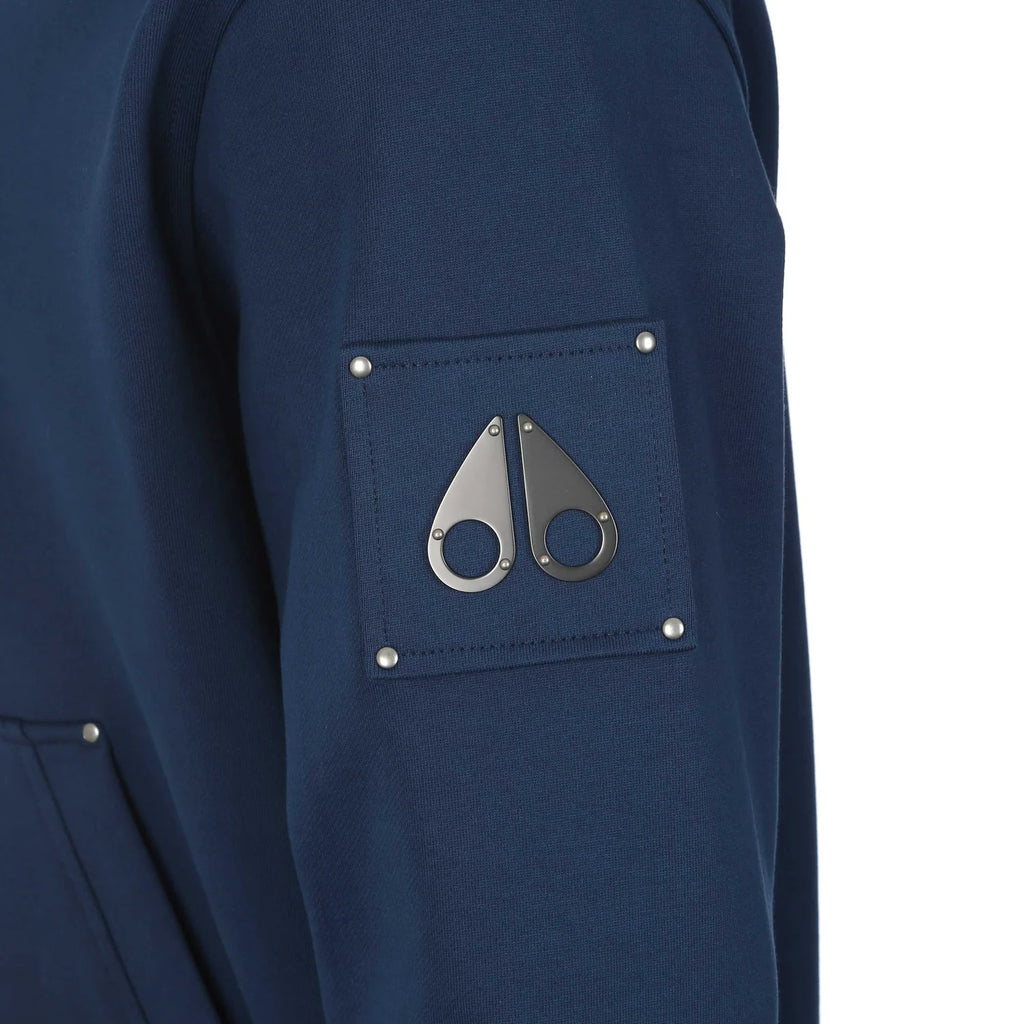 Moose Knuckles Navy Blue Pullover Hoodie with Metallic Sleeve Emblem