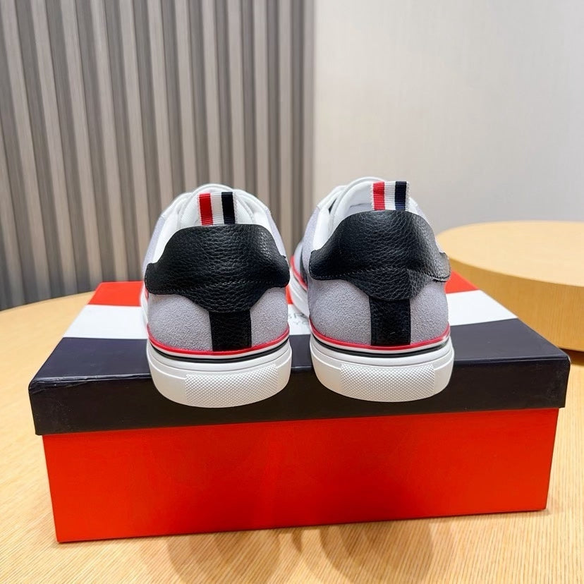 Three-Stripe Color-Block Sneaker — Red & Black Sole Detail