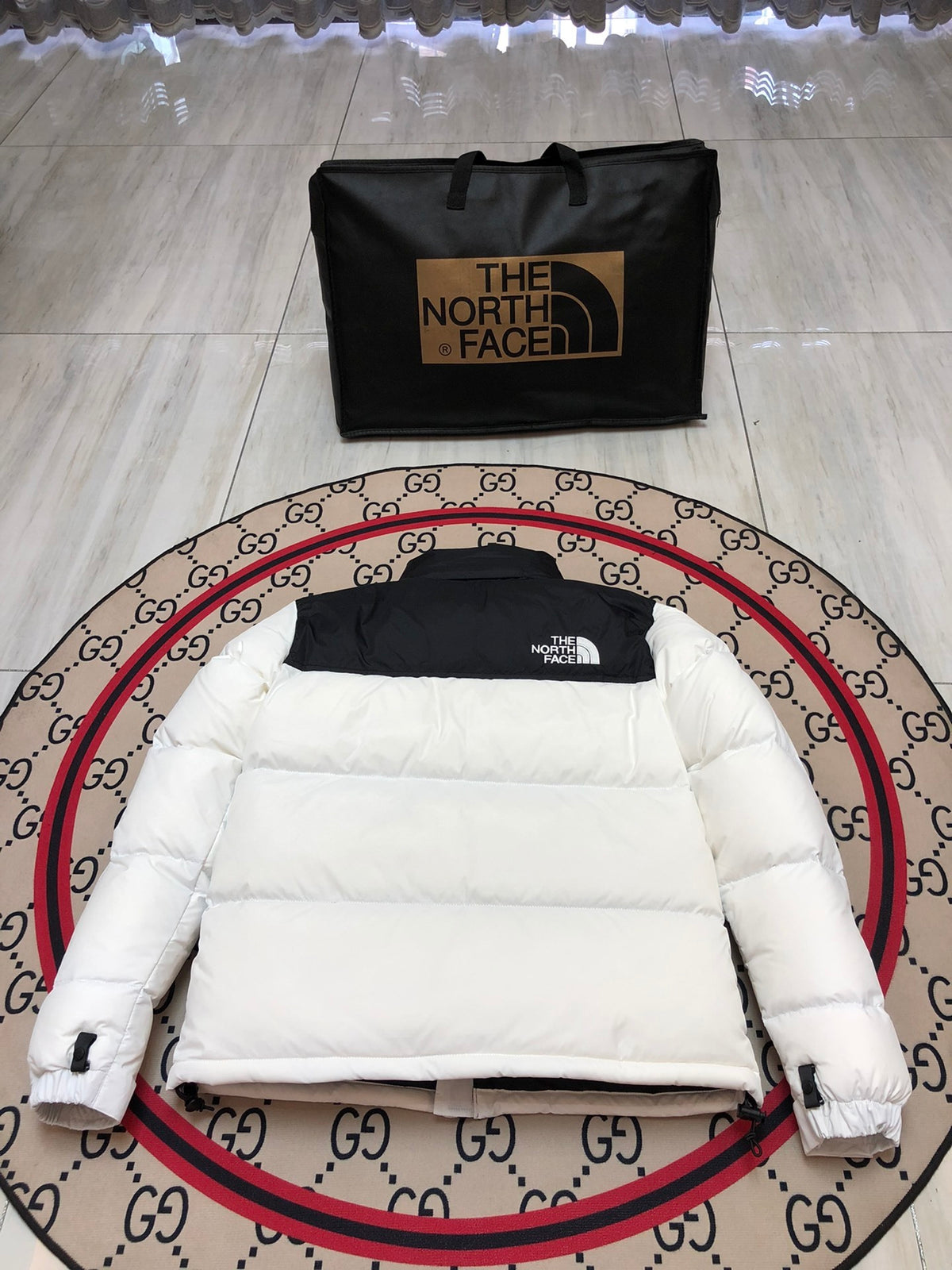 The North Face Quilted White and Black Stand-Collar Puffer Jacket