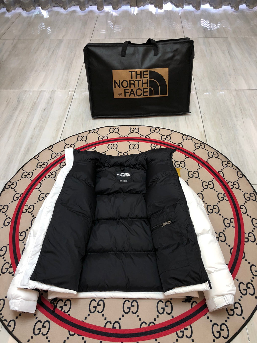 The North Face Quilted White and Black Stand-Collar Puffer Jacket