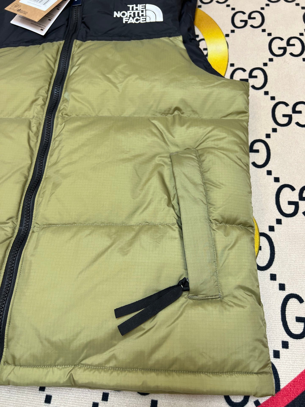 The North Face Quilted Olive Green and Black Puffer Vest