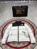 The North Face Quilted White and Black Stand-Collar Puffer Jacket