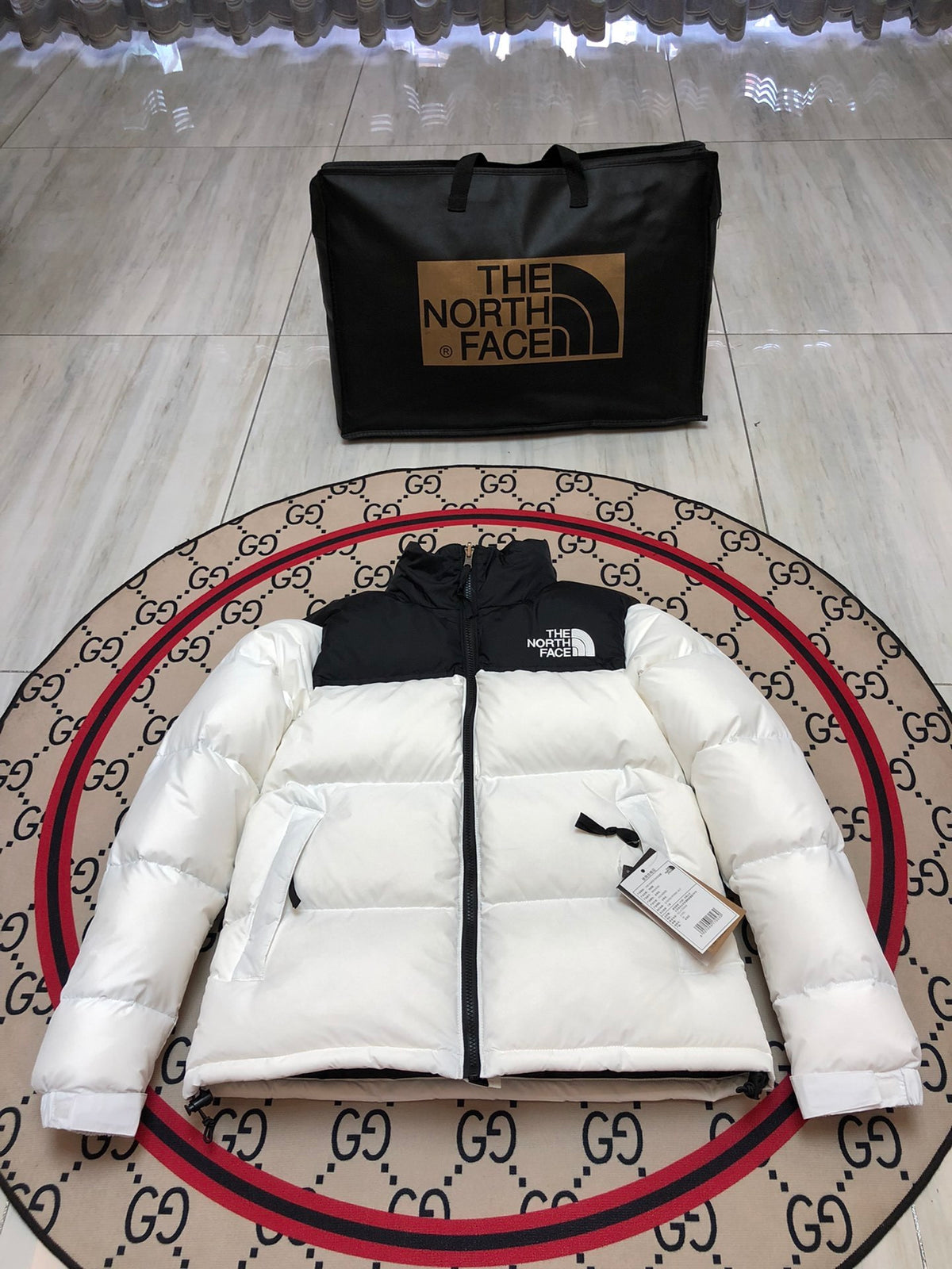 The North Face Quilted White and Black Stand-Collar Puffer Jacket