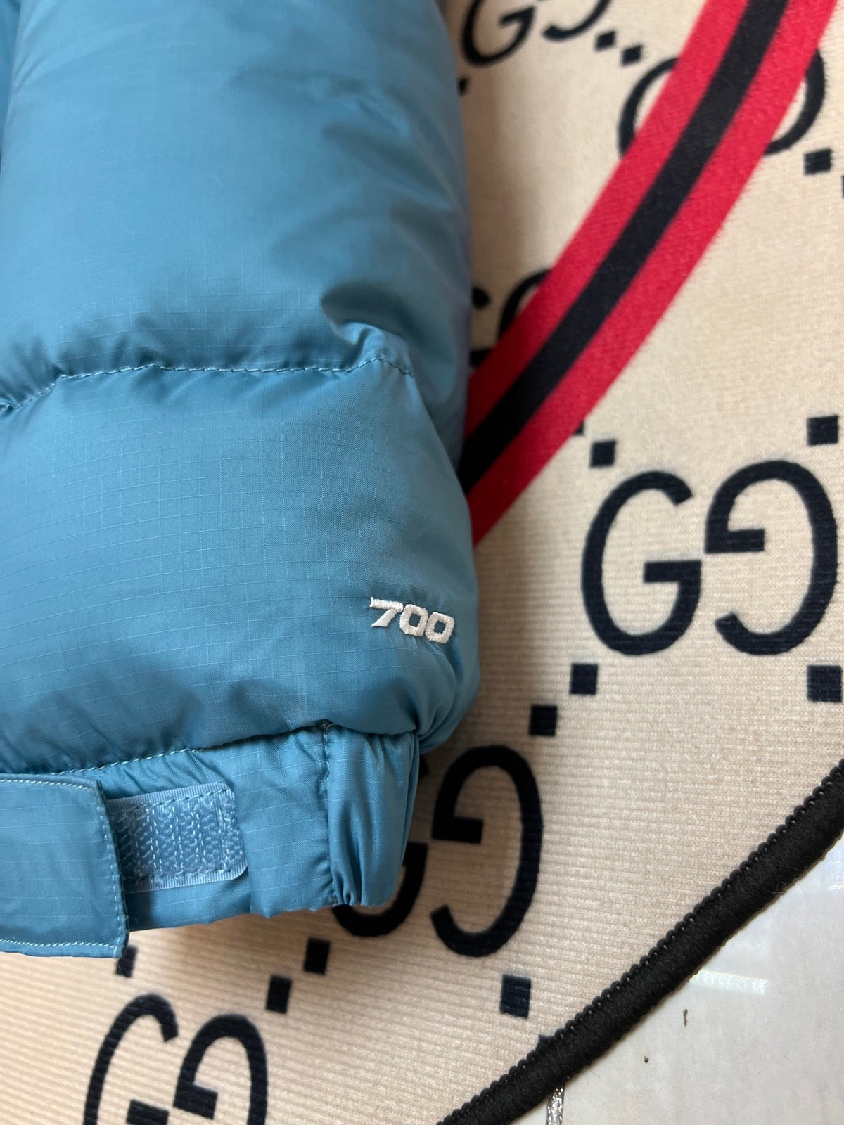 The North Face Quilted Teal Blue and Navy Stand-Collar Puffer Jacket