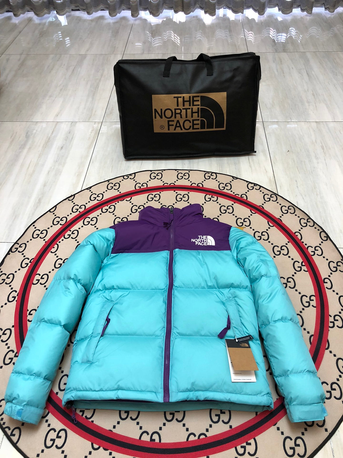The North Face Quilted Turquoise and Purple Stand-Collar Puffer Jacket