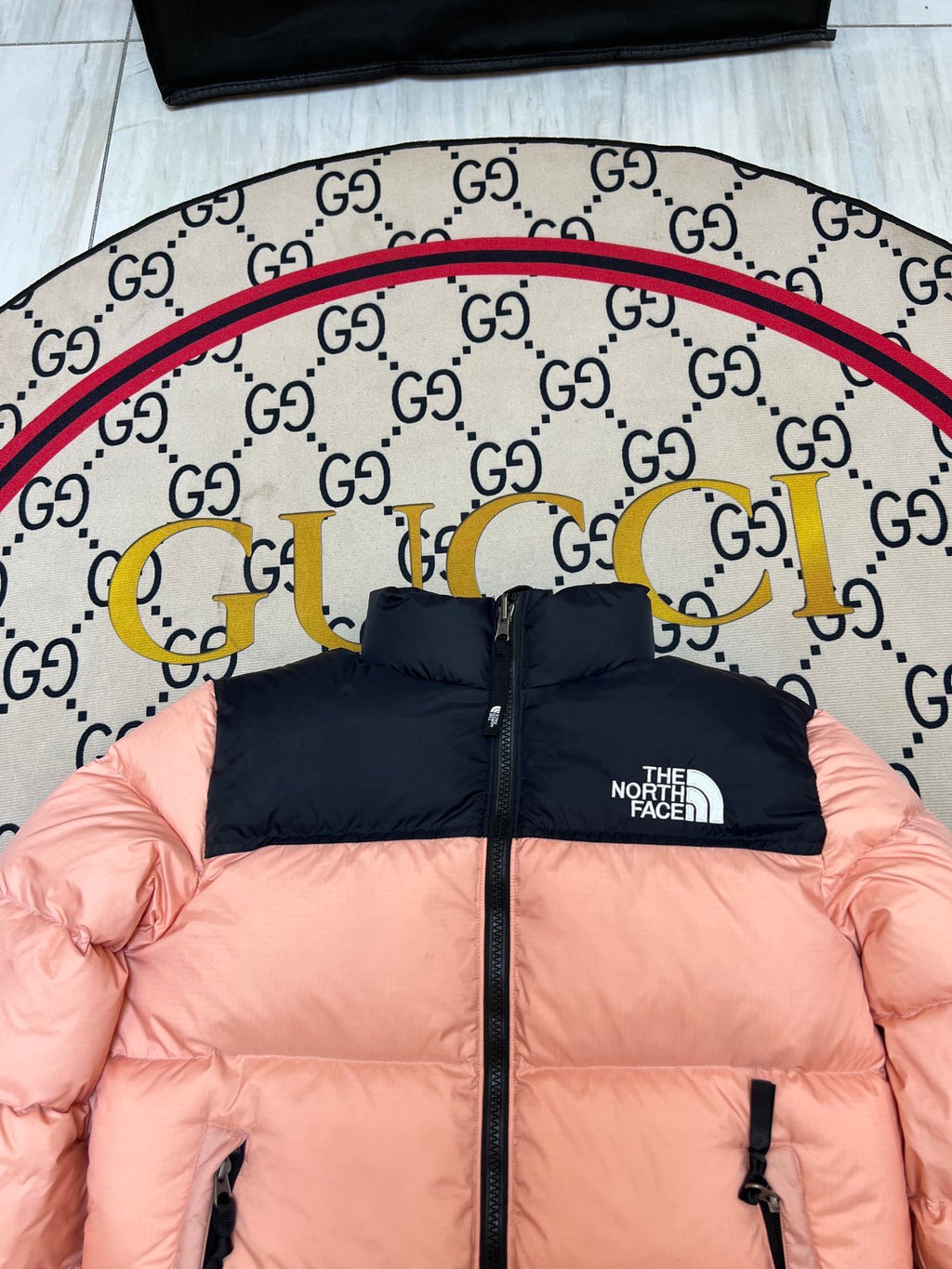 The North Face Quilted Peach Pink and Black Stand-Collar Puffer Jacket