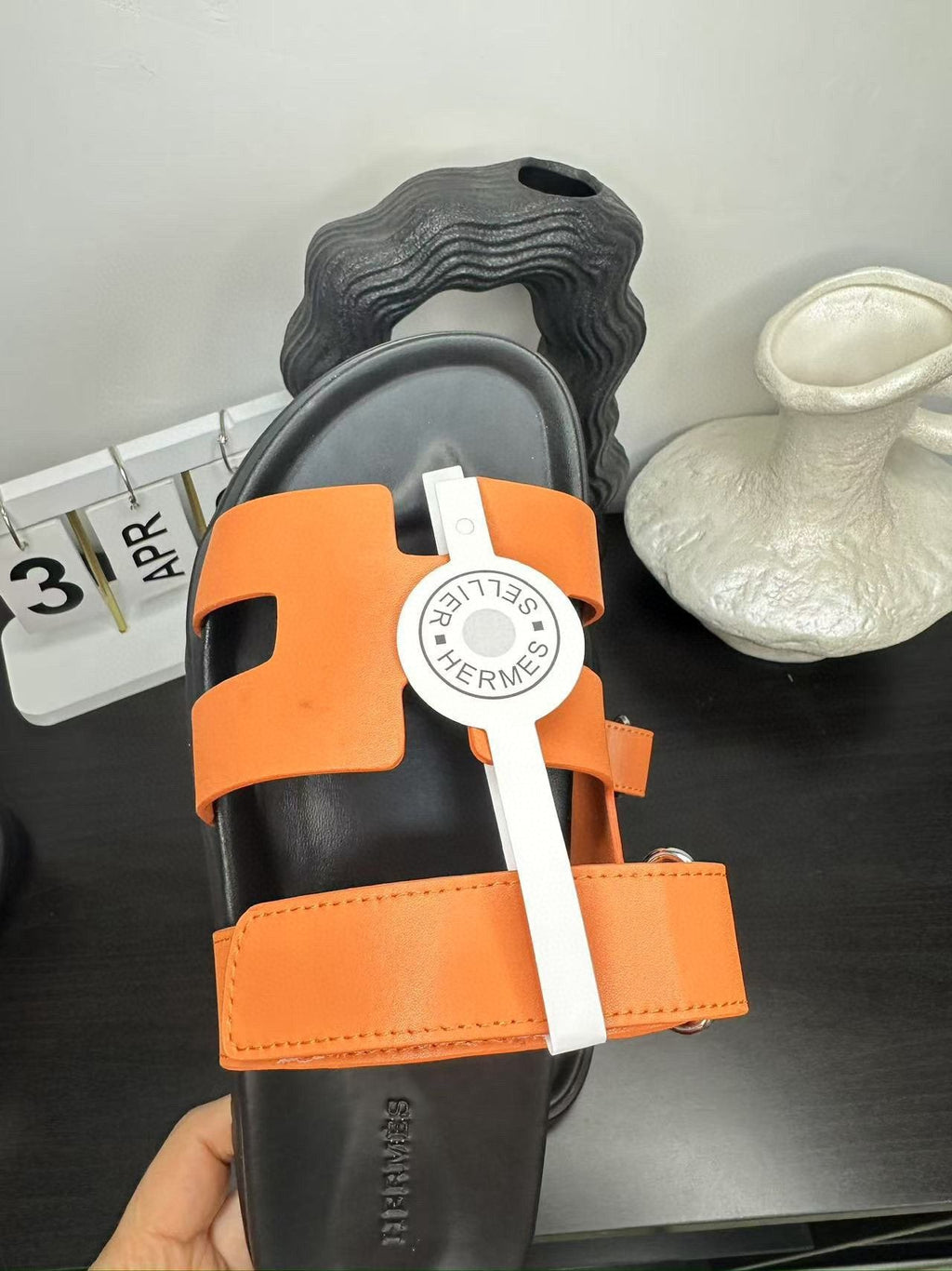 Hermès Orange Interwoven Slide Sandals - Orange and Black