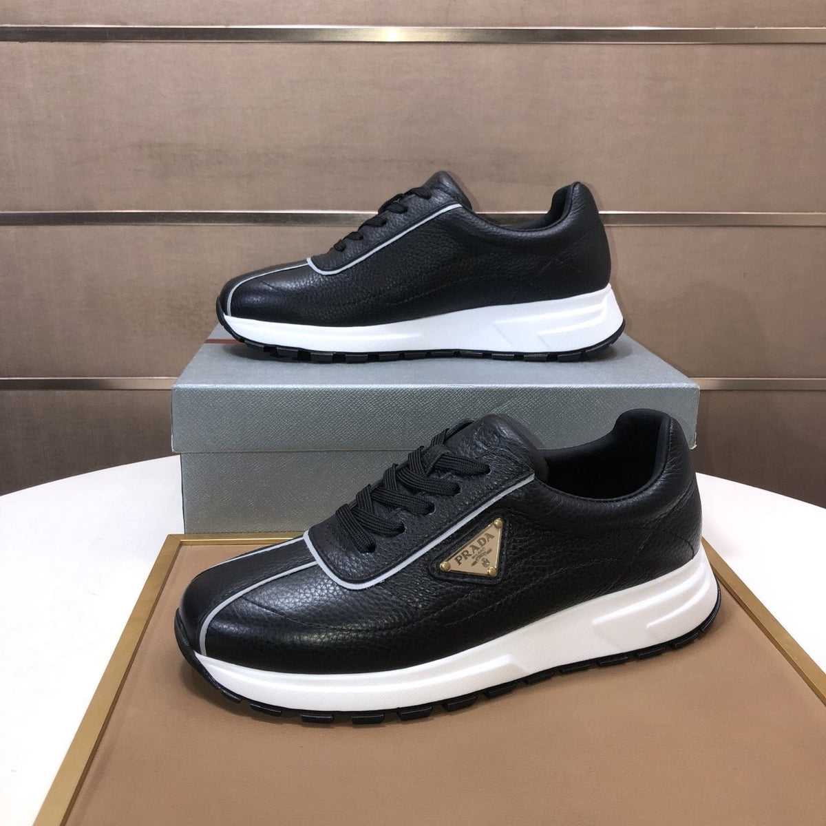 Prada Triangle Plaque Low-Top Sneakers - Triangular Side Plaque Detail