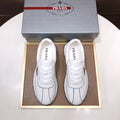 Prada Triangle Plaque Low-Top Sneakers - Triangular Side Plaque Detail